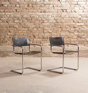 Chaises en acier tubulaire / cuir style Breuer 